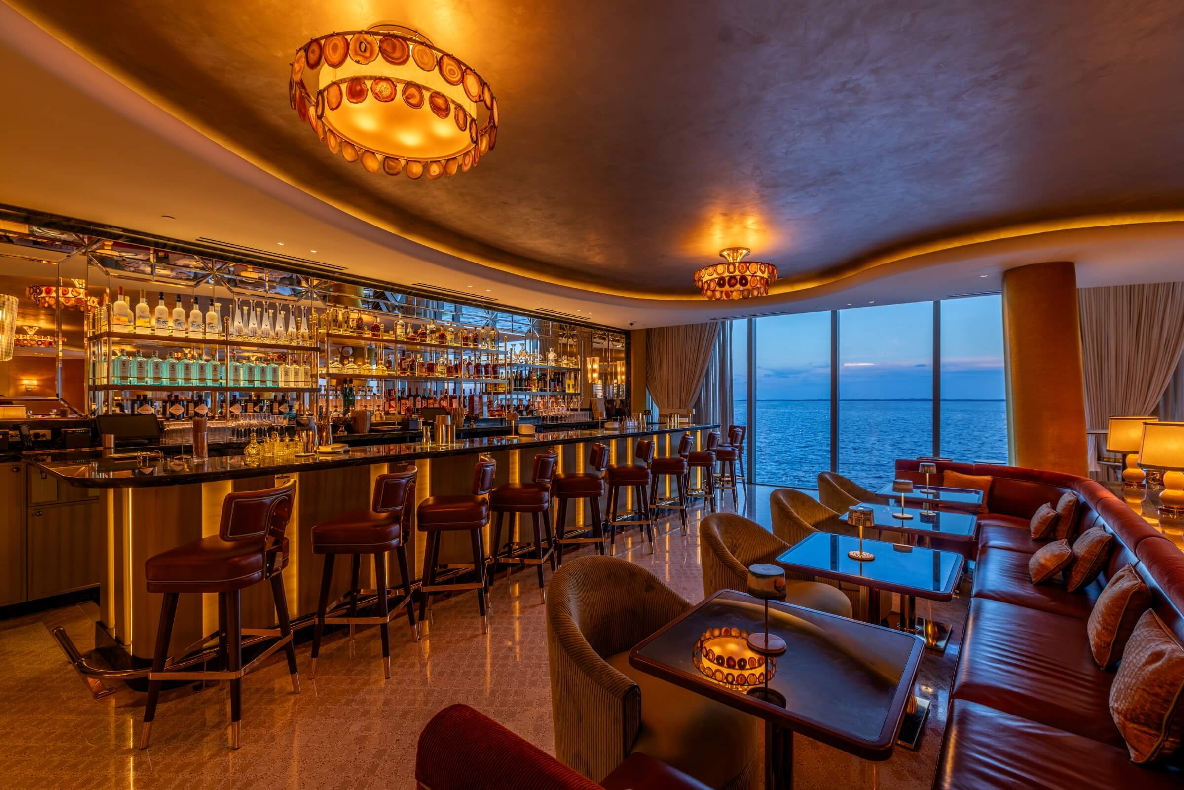 Tables and Chairs Inside a Bar
